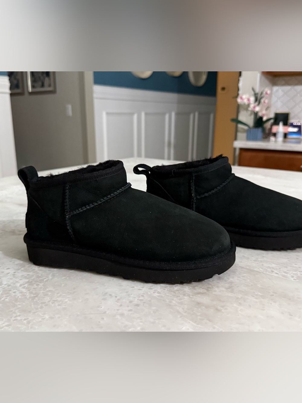 New without box women’s UGG Classic Ultra Mini Booties boots in black. Size 6.